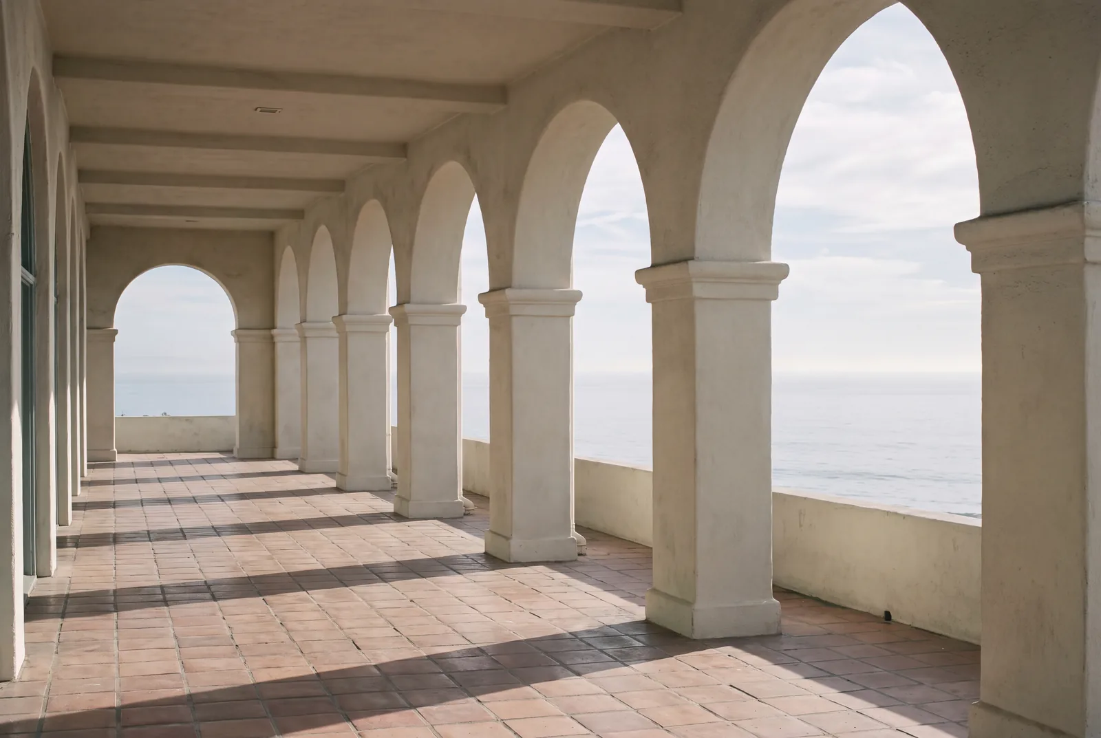 The Mediterranean arcade at the Bel-Air Bay Club, the Pacific beyond